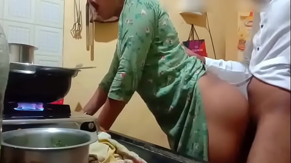 Hot neighbour aunty gets fucked by the young boy in kitchen